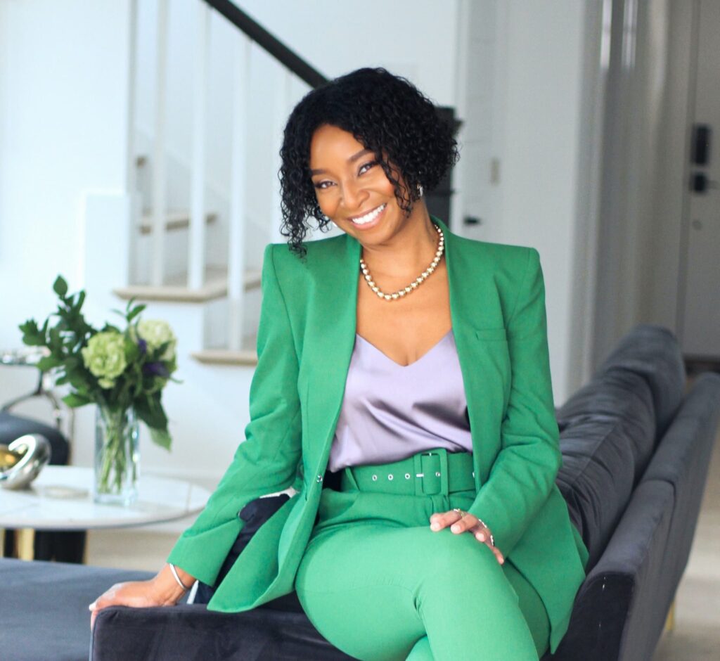 Dr. Iman Hypolite, Johns Hopkins-trained double board-certified psychiatrist and therapist for high-achieving women, in a professional setting.